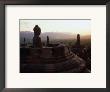 Statue Of Buddha At Dusk Borobudur, Java, Central Java, Indonesia by Glenn Beanland Limited Edition Print