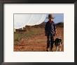 Boy With Dog Walking Past Solar Energy Dishes, New South Wales, Australia by Oliver Strewe Limited Edition Print