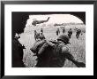 Us Marines 163Rd Helicopter Squadron Discharging South Vietnamese Troops For An Assault by Larry Burrows Limited Edition Print