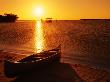 Canoe On Beach At Sunset, Kingston Keys, Ten Thousand Islands, Everglades National Park, Usa by Witold Skrypczak Limited Edition Print
