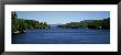 Trees On Both Sides Of A Lake, Long Lake, Adirondack State Park, New York State, Usa by Panoramic Images Limited Edition Print
