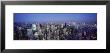 Buildings Lit Up In A City, New York, Usa by Panoramic Images Limited Edition Pricing Art Print
