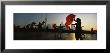 Silhouette Of A Group Of People Dancing In Front Of Pudong, The Bund, Shanghai, China by Panoramic Images Limited Edition Print