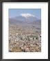 View Across City From El Alto, With Illimani Volcano In Distance, La Paz, Bolivia, South America by Tony Waltham Limited Edition Print