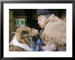 Elderly Female Vendor At Mercado De Los Brujas With Her Dog, La Paz, Bolivia by Brent Winebrenner Limited Edition Print