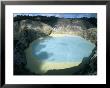 One Of Three Crater Lakes At The Summit Of Kelimutu Volcano Near Moni by Robert Francis Limited Edition Pricing Art Print
