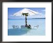 White Table, Chairs And Parasol In The Ocean, Bora Bora (Borabora), Society Islands by Mark Mawson Limited Edition Print