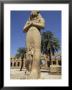 Ramses Ii And Daughter Bant Anta, In Forecourt Of The Temple Of Karnak, Egypt by Ken Gillham Limited Edition Print