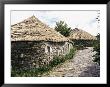 Rounded Thatched Pallozas Of Celtic Origin, Cebreiro, Lugo Area, Galicia, Spain by Ken Gillham Limited Edition Print