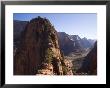 Picnickers Eat On A Narrow Ledge Over The Valley, Zion National Park, Utah by Taylor S. Kennedy Limited Edition Print