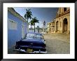 View Across Plaza Mayor With Old American Car Parked On Cobbles, Trinidad, Cuba, West Indies by Lee Frost Limited Edition Print