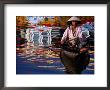 Woman In Boat, Reflection Of Newly Painted Boat On Perfume River, Hue, Thua Thien-Hue, Vietnam by Stu Smucker Limited Edition Print
