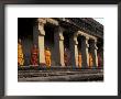Monks Behind The Columns Of The Gallery At Angkor Wat, Siem Reap, Cambodia by Keren Su Limited Edition Print