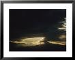 Twilight View Of Clouds Over Mountains by Raul Touzon Limited Edition Print