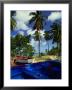 Wooden Fishing Boats Among Palm Trees, Pigeon Point, Trinidad & Tobago by Michael Lawrence Limited Edition Pricing Art Print