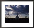 A Cluster Of Teepees And Frames In A New Mexico Field by Raul Touzon Limited Edition Print