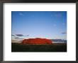 View Of Ayers Rock Under A Twilight Sky by Jason Edwards Limited Edition Print