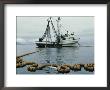 A Fishing Boat With A Large Net In The Water by Robert Sisson Limited Edition Print