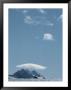 A View Across A Glacier Of Mount Fordell, Capped By A Cloud by Gordon Wiltsie Limited Edition Print