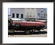 Pink Cadillac Being Transported, Duval Street, Key West, Florida, Usa by R H Productions Limited Edition Print