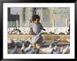 Child Chasing The Famous White Pigeons, Mazar-I-Sharif, Afghanistan by Jane Sweeney Limited Edition Print