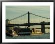 Tugboat Pulling A Barge On The East River Under The Manhattan Bridge by Todd Gipstein Limited Edition Print