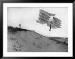 A Glider Rider Jumps Off A Dune At The Chanute Gliding Camp On The Shores Of Lake Michigan by Dr. Gilbert H. Grosvenor Limited Edition Print