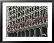 American Flags Decorate The Front Of A Michigan Avenue Building by Paul Damien Limited Edition Pricing Art Print