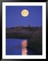 A Full Moon Is Reflected In The Mackenzie River by Raymond Gehman Limited Edition Print