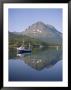Boat And Mountains Reflected In Tranquil Water, Near Tromso, North Norway, Norway by David Lomax Limited Edition Print