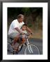 Father And Son Riding A Bicycle, Papeete, French Polynesia by Paul Kennedy Limited Edition Print