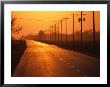 A Country Highway Fades Into The Sunset Near Wood River, Nebraska by Joel Sartore Limited Edition Pricing Art Print