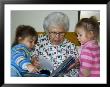 Great Grandmother Reads To Her Great Grandchildren by Stacy Gold Limited Edition Print