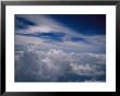A Cloud-Filled Sky Above Miami by Raul Touzon Limited Edition Print