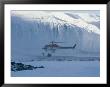 A Helicopter Delivers Supplies To Scientists Working In Antarctica by Maria Stenzel Limited Edition Print