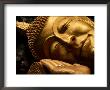 Sleeping Buddha Head With Frangipani Petals In Open Palm, Luang Prabang, Laos by Anthony Plummer Limited Edition Print