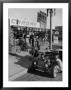 Men Working On A Chromed Roadster In Preparation For A Drag Race by Ralph Crane Limited Edition Pricing Art Print