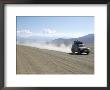 Land Cruiser On Altiplano Track Going To Laguna Colorado, Southwest Highlands, Bolivia by Tony Waltham Limited Edition Print