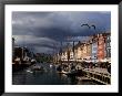 Tourist Boat Cruises Nyhavn, New Harbor, Along The Scenic Canal In Copenhagen by Keenpress Limited Edition Print