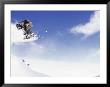 Man On Snowboard Jumping by Kurt Olesek Limited Edition Print