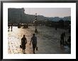 People Walking Along Waterfront Opposite Piazza San Marco At Dawn, Venice, Italy by Juliet Coombe Limited Edition Print