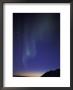 Northern Lights Curtain Of Green Over A Fortress Mountain, Brooks Range, Alaska, Usa by Hugh Rose Limited Edition Print