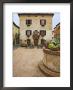Local Restaurant In Piazza, Pienza, Italy by Dennis Flaherty Limited Edition Print