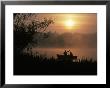 Fishermen In Small Boat, Lake Cassidy, Wa by Jim Corwin Limited Edition Print