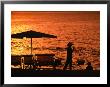 Local Carrying Baskets Along Nha Trang Beach At Sunrise, Nha Trang, Khanh Hoa, Vietnam by John Banagan Limited Edition Print