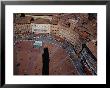 Bustle Of Il Campo From Top Of Torre Del Mangia, With Tower Shadow Across Square, Siena, Italy by Glenn Beanland Limited Edition Print