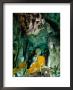 Seated Buddha Statues In Saffron Cloth Inside Cave, Chiang Dao, Thailand by Ryan Fox Limited Edition Pricing Art Print