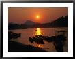 The Sun Setting Over Luang Prabang - Northern Laos, Luang Prabang, Laos by Juliet Coombe Limited Edition Print