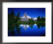 The Matterhorn And Hiker Reflected In Waters Of Grindjisee, Valais, Switzerland by Gareth Mccormack Limited Edition Print
