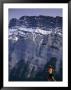 Woman Running In Front Of Mountain, Banff, Canada by Woods Wheatcroft Limited Edition Print